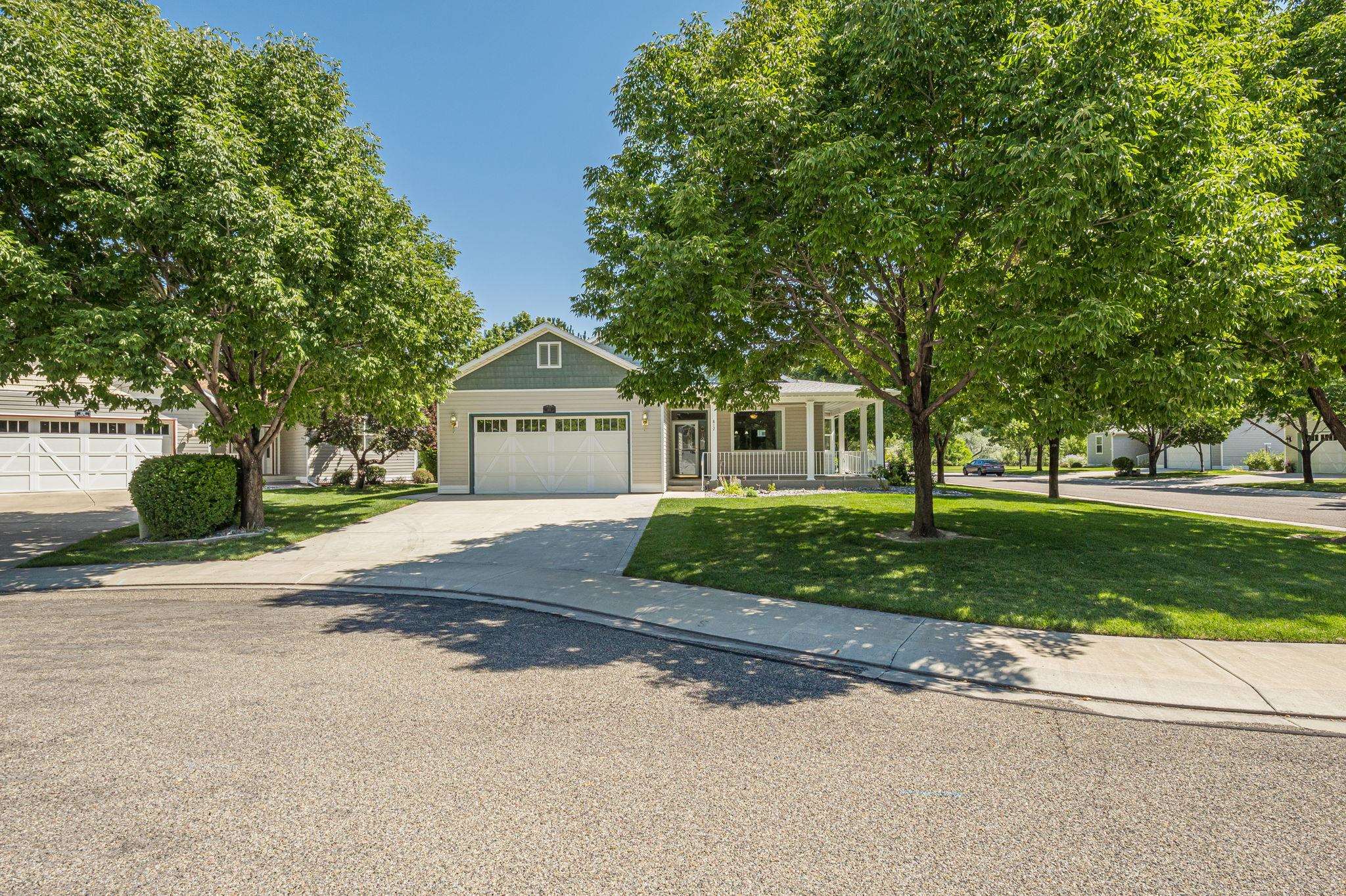 812 Alyssum Court Fruita, CO 81521 - Photo 41 of 41 a front view of a house with a yard and a garage
