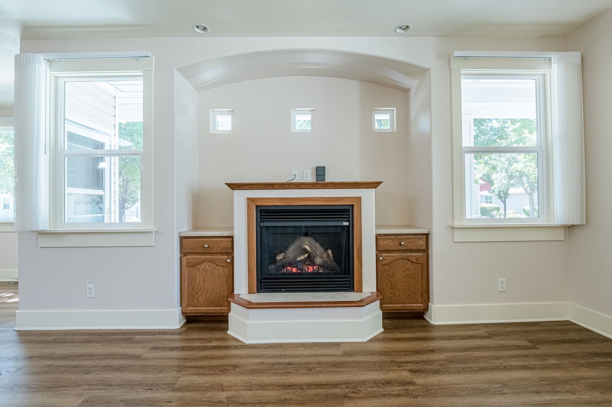 812 Alyssum Court Fruita, CO 81521 - Photo 10 of 41 a living room with furniture and a fireplace