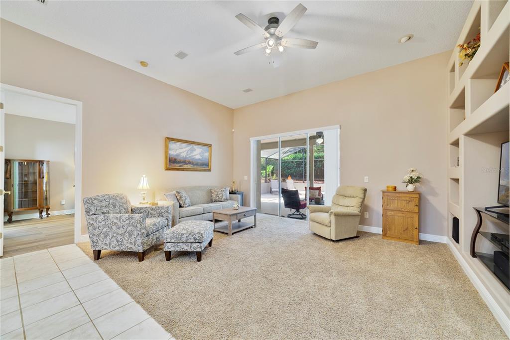 3374 Furlong Way Gotha, FL 34734 - Photo 12 of 38 a bed room with furniture and a chandelier