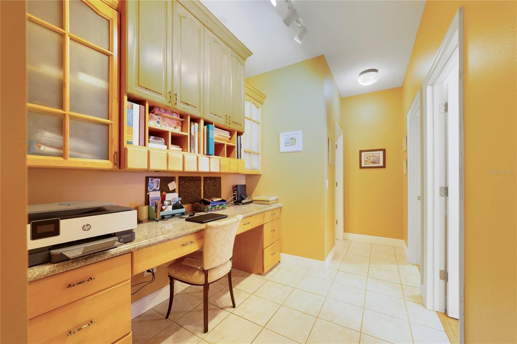 3374 Furlong Way Gotha, FL 34734 - Photo 18 of 38 a kitchen with a sink cabinets and utility room