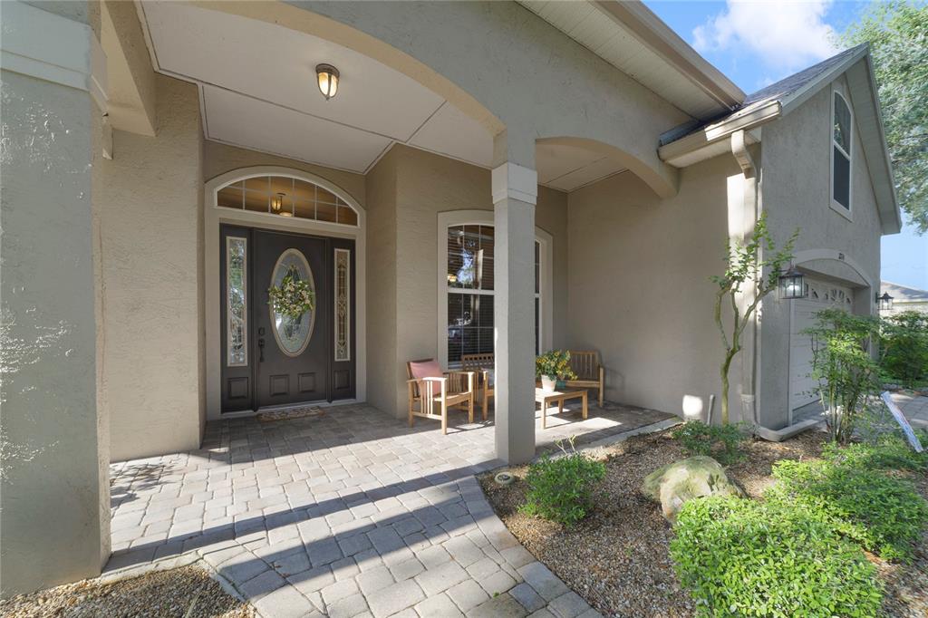 3374 Furlong Way Gotha, FL 34734 - Photo 2 of 38 a front view of a house with garden