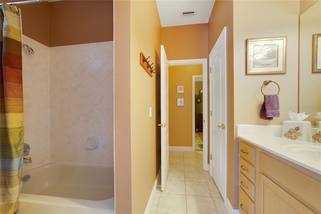 3374 Furlong Way Gotha, FL 34734 - Photo 25 of 38 a bathroom with a sink and a mirror