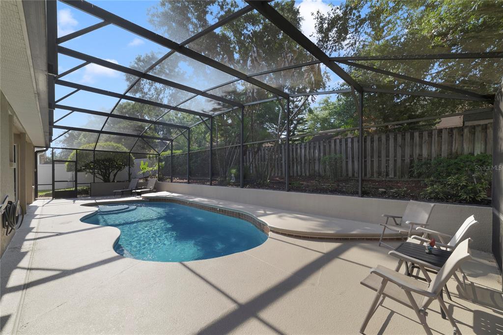 3374 Furlong Way Gotha, FL 34734 - Photo 31 of 38 a view of a patio with a table and chairs