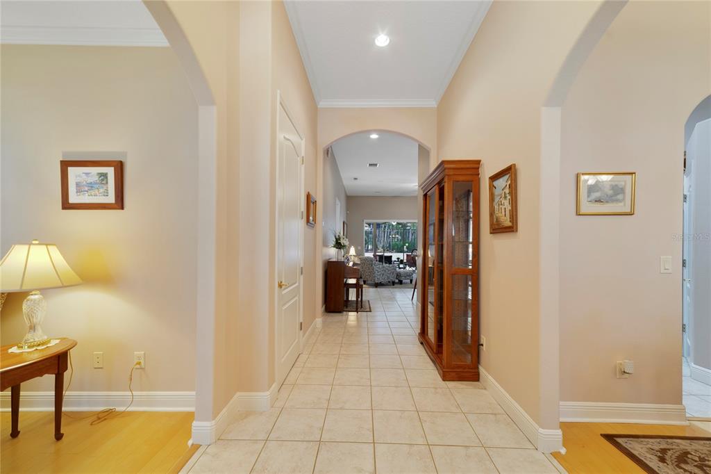 3374 Furlong Way Gotha, FL 34734 - Photo 4 of 38 a view of a hallway with couch and a potted plant