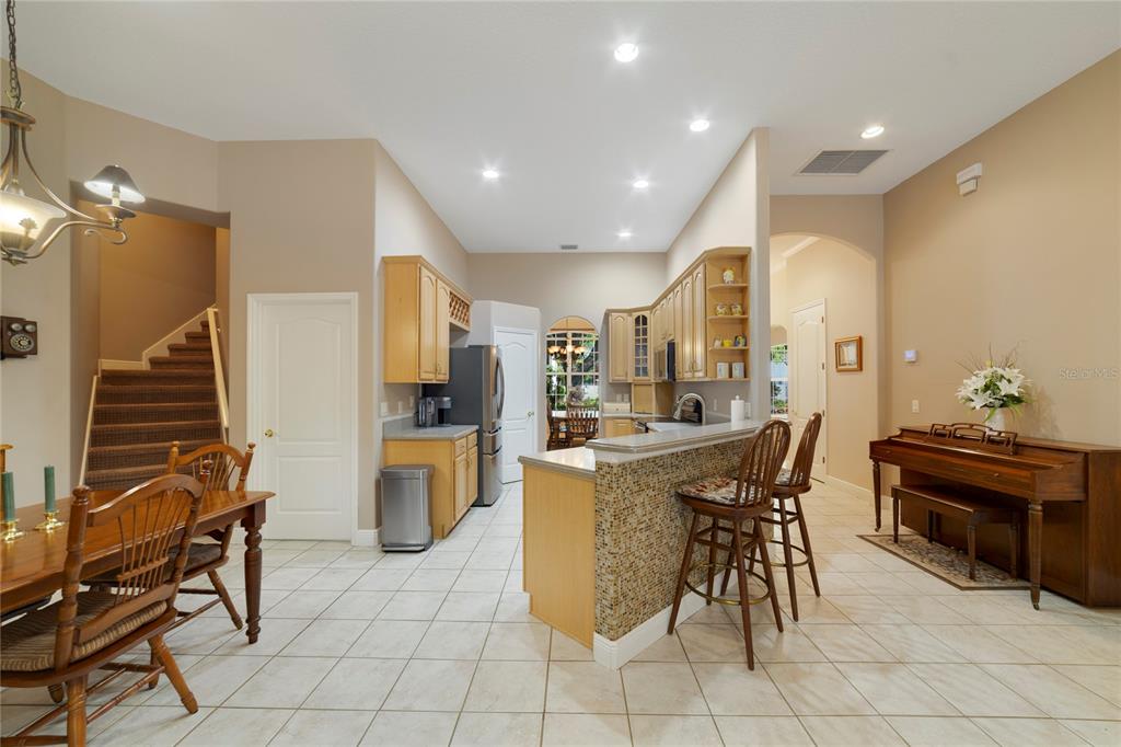 3374 Furlong Way Gotha, FL 34734 - Photo 10 of 38 a view of a dining room with furniture