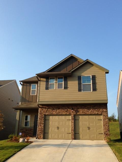 2797 Lakeview Walk, Unit 42 Decatur, GA 30035 - Photo 1 of 1 a front view of a house with garage