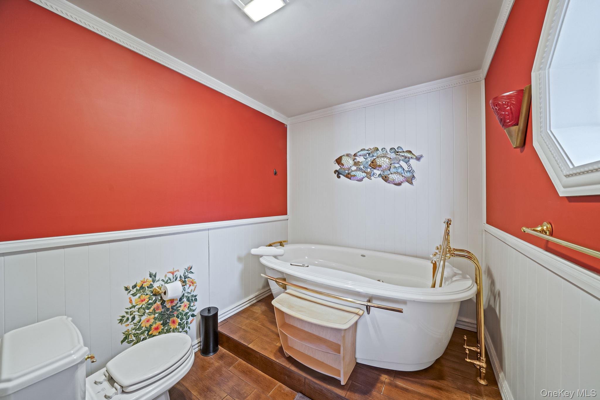 778 Terry Road Hauppauge, NY 11788 - Photo 15 of 29 Bathroom with tile flooring, freestanding tub