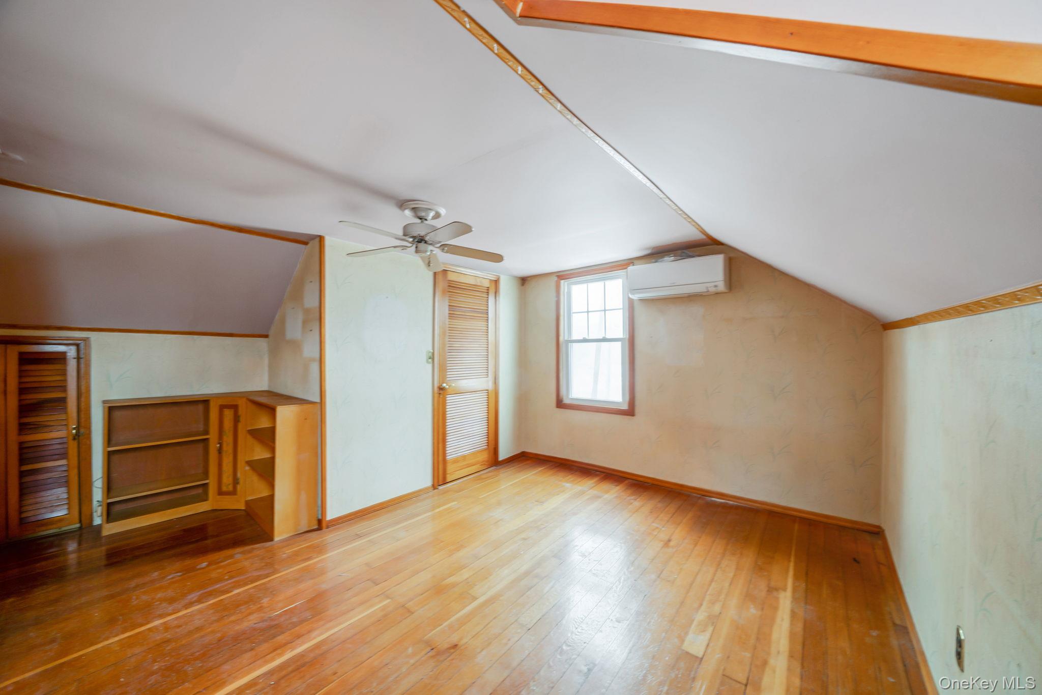 778 Terry Road Hauppauge, NY 11788 - Photo 21 of 29 Bonus room/home office 5th bedroom option featuring hardwood flooring & closet