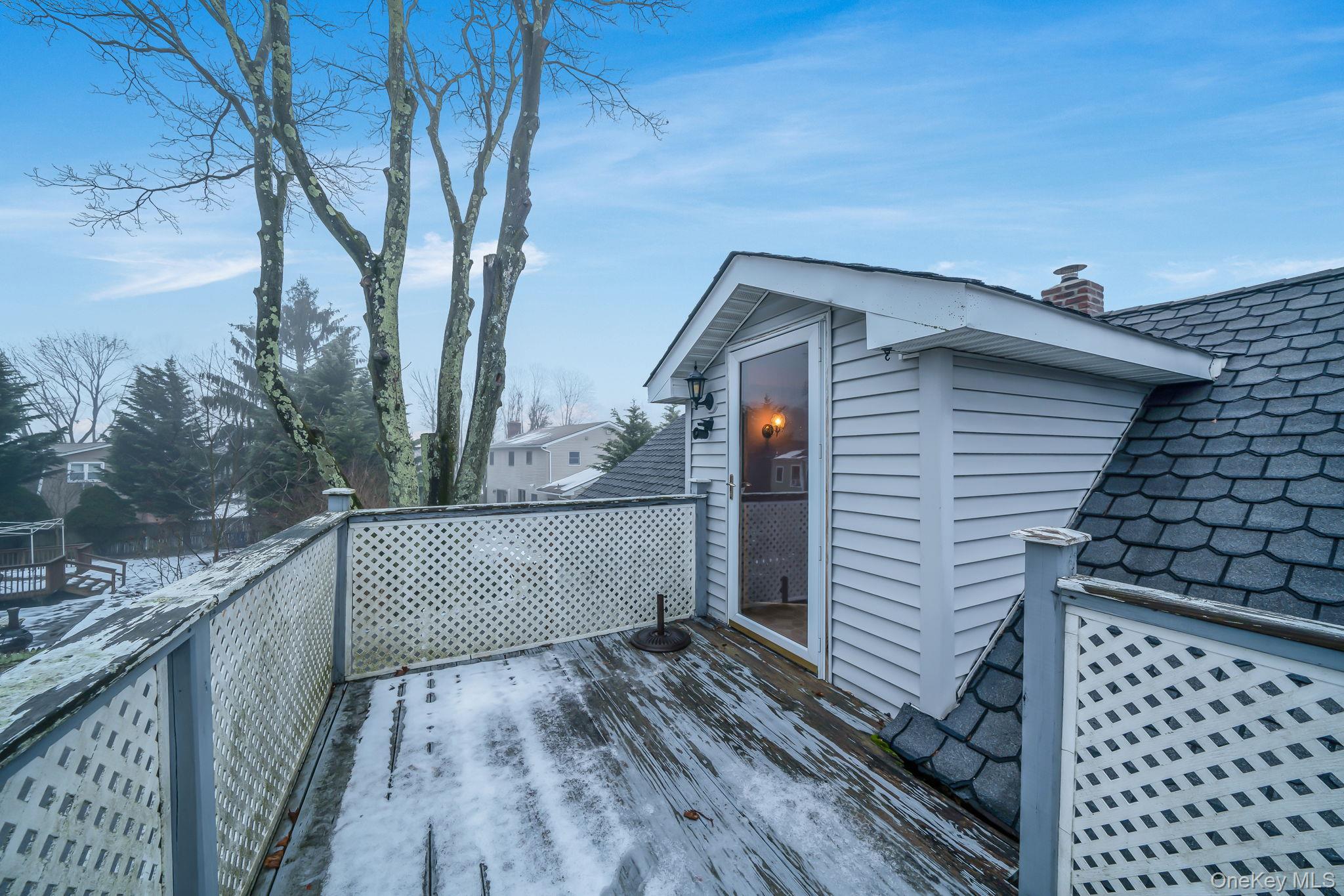 778 Terry Road Hauppauge, NY 11788 - Photo 23 of 29 Second floor deck off of bonus room/2nd floor primary bedroom