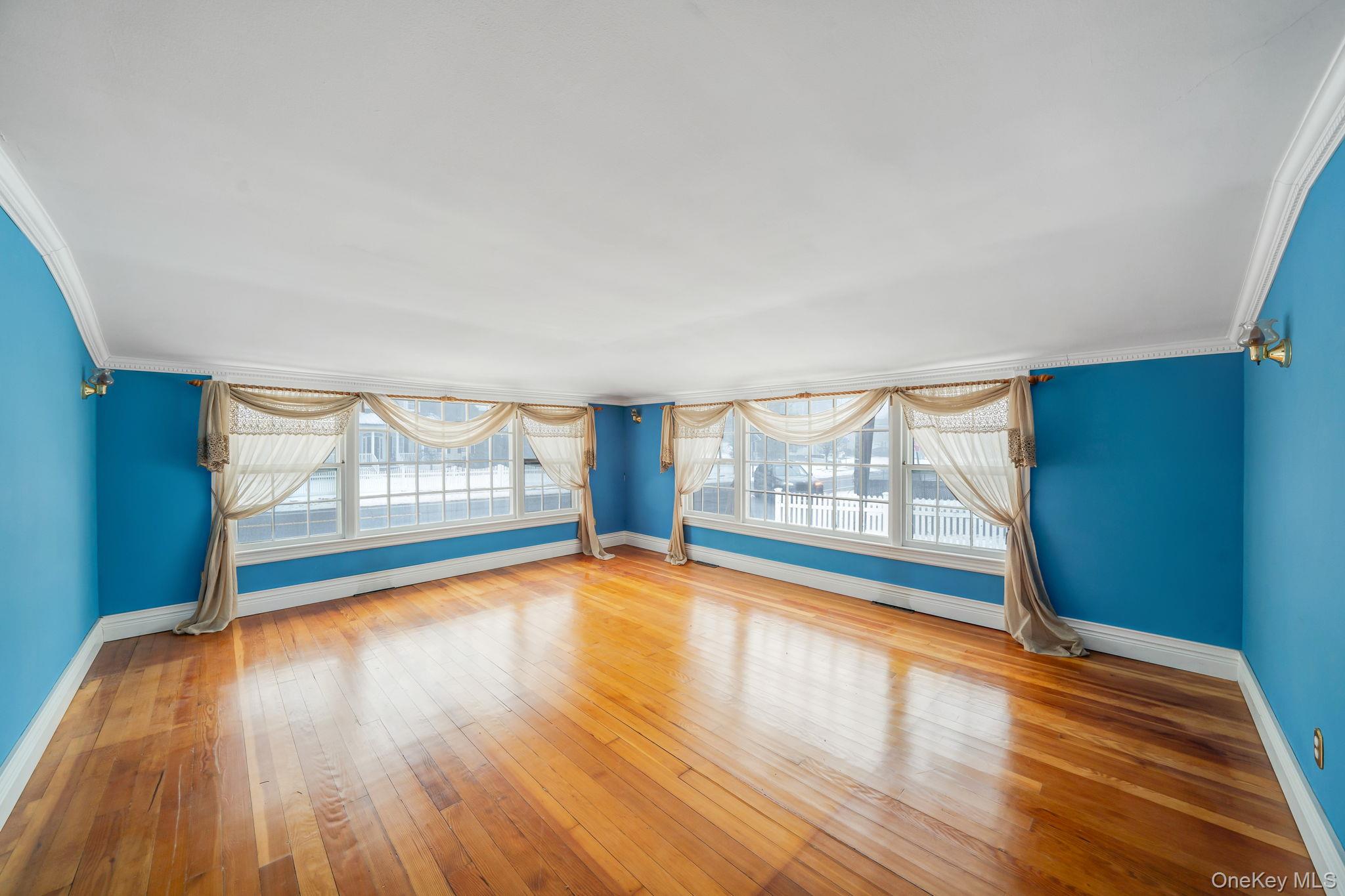 778 Terry Road Hauppauge, NY 11788 - Photo 7 of 29 Tranquil sun drenched living room, hardwood flooring