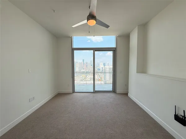 a view of an empty room with window