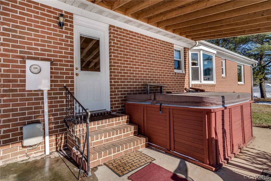 11711 Genito Road Midlothian, VA 23112 - Photo 12 of 18 a backyard of a house with wooden fence