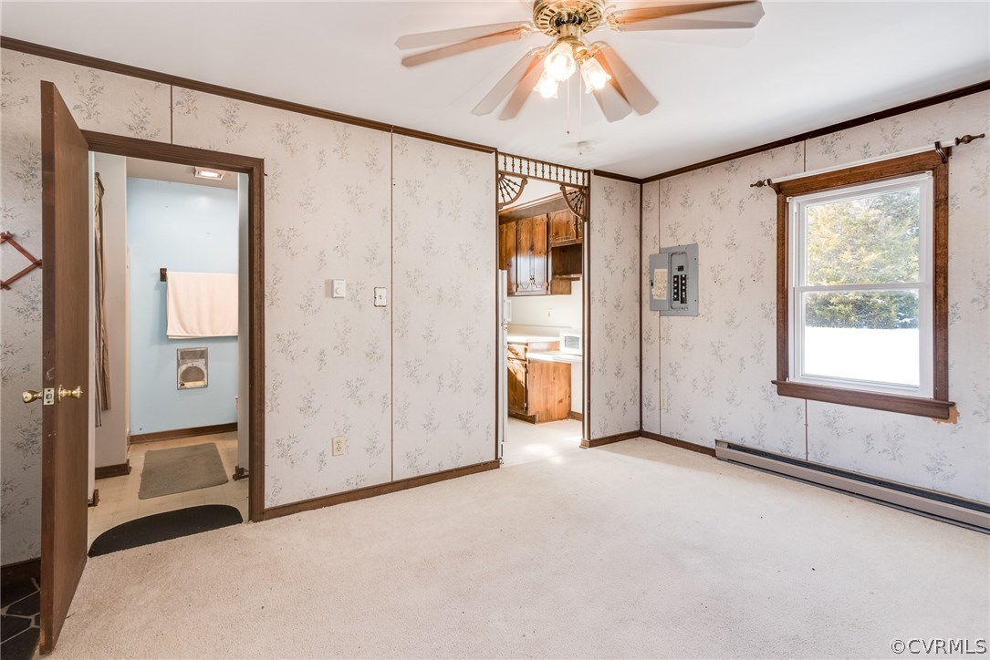 11711 Genito Road Midlothian, VA 23112 - Photo 16 of 18 an empty room with fan and windows