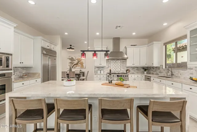 a kitchen with sink cabinets and window
