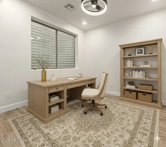 a view of a workspace with furniture