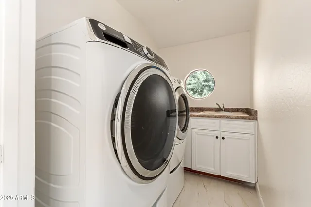 a view of an empty room with closet
