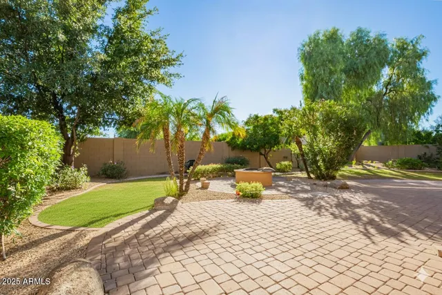 a view of a golf course with a garden