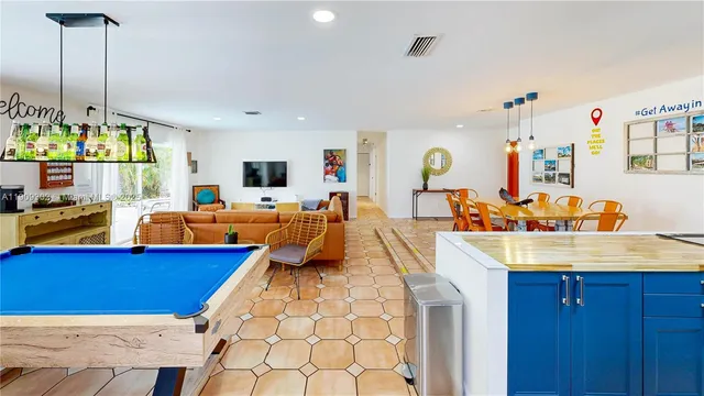 a bathroom with a tub and shower curtain
