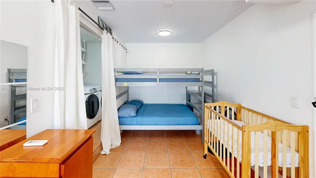 a bathroom with a shower and a door