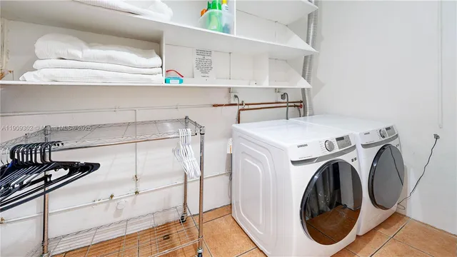 a bedroom with a bed and cabinets
