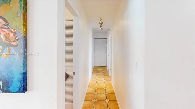 a view of living room with furniture and flat screen tv
