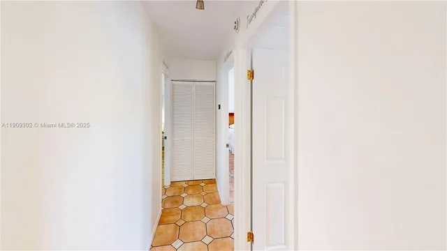 a bathroom with a sink a mirror and a toilet