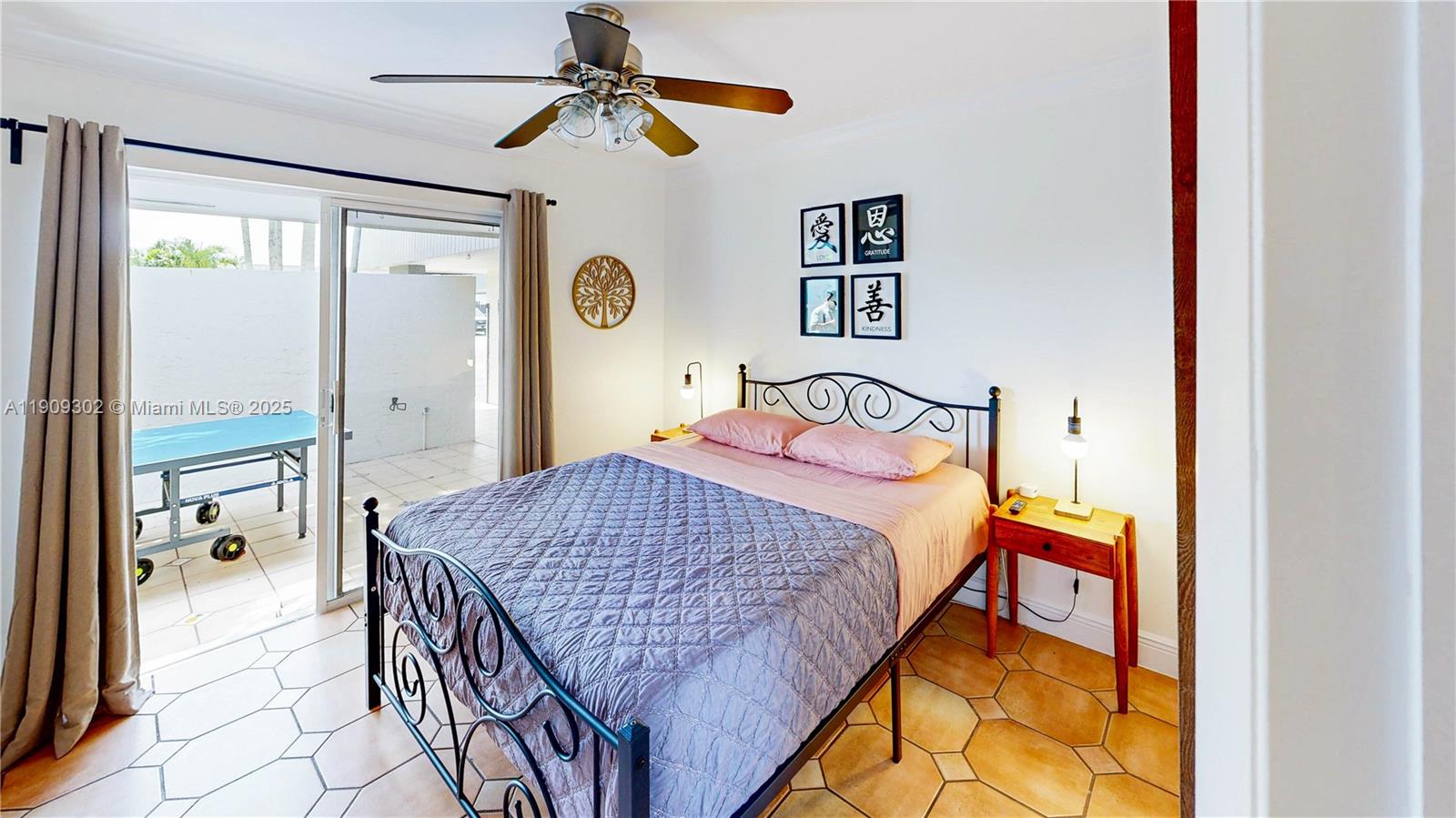 9614 Southwest 134th Court Miami, FL 33186 - Photo 32 of 69 a bedroom with a bed and a chandelier