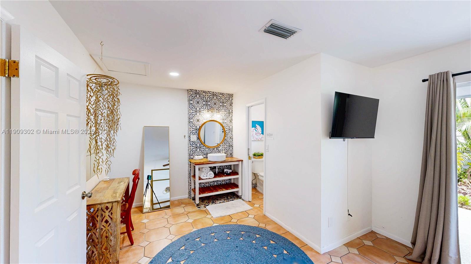 9614 Southwest 134th Court Miami, FL 33186 - Photo 38 of 69 a view of living room with furniture and flat screen tv