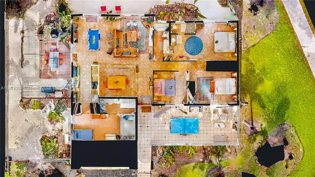 a view of a swimming pool with a yard