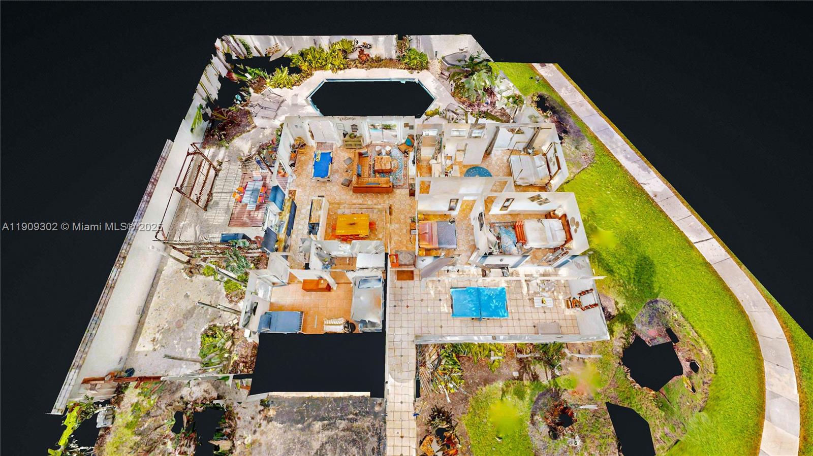9614 Southwest 134th Court Miami, FL 33186 - Photo 45 of 69 an aerial view of a swimming pool with a table and chairs