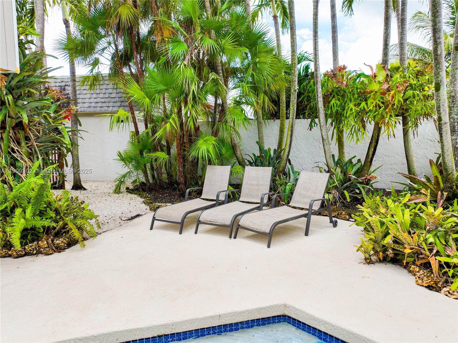 9614 Southwest 134th Court Miami, FL 33186 - Photo 53 of 69 a view of a backyard with a patio