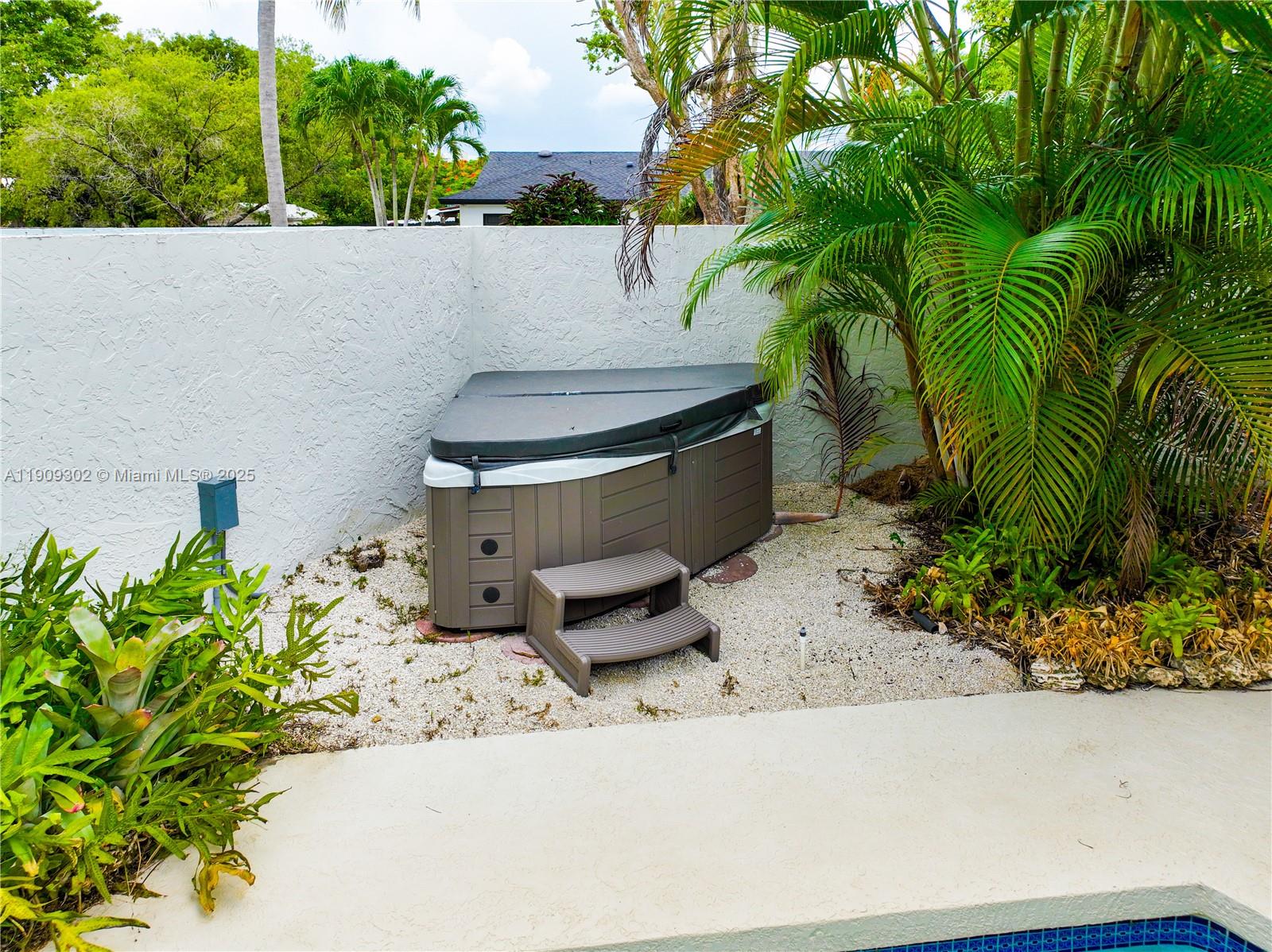 9614 Southwest 134th Court Miami, FL 33186 - Photo 54 of 69 a picture of a house with a yard and sitting area