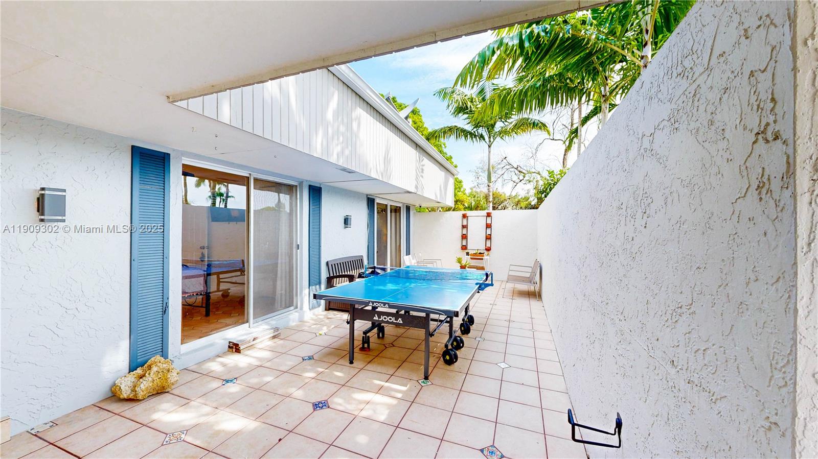 9614 Southwest 134th Court Miami, FL 33186 - Photo 6 of 69 a dining room with a table and chairs