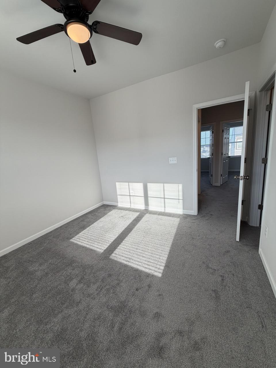 146 Galaxy Place Stephenson, VA 22656 - Photo 31 of 46 an empty room with chandelier fan and windows