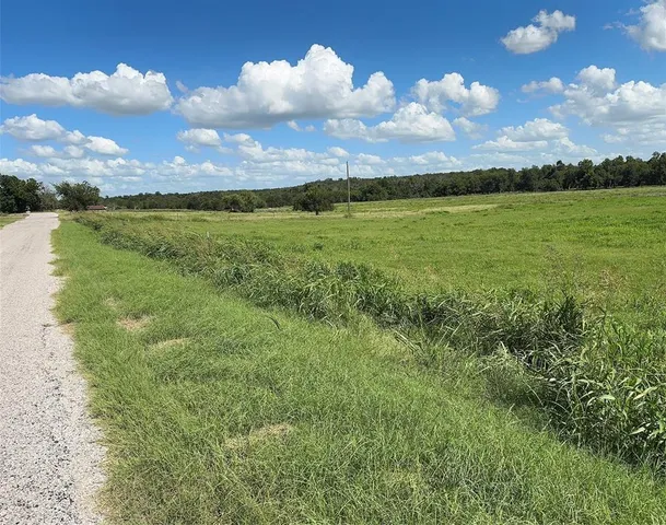 a view of a lake with a city