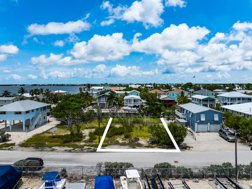 7 Calico Jack Circle Cudjoe, FL 33042 - Photo 1 of 17 a view of an outdoor space and lakeside