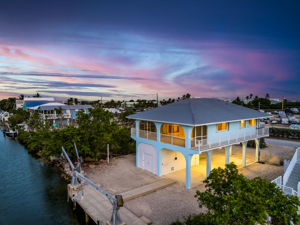 7 Calico Jack Circle Cudjoe, FL 33042 - Photo 16 of 17 an aerial view of a house with a ocean view
