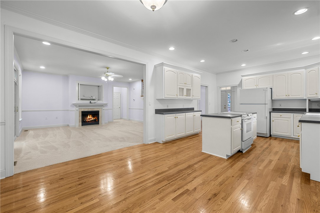 110 Brookstone Way Central, SC 29630 - Photo 12 of 46 This inviting space combines a functional kitchen with a cozy living area, ideal for relaxed living.