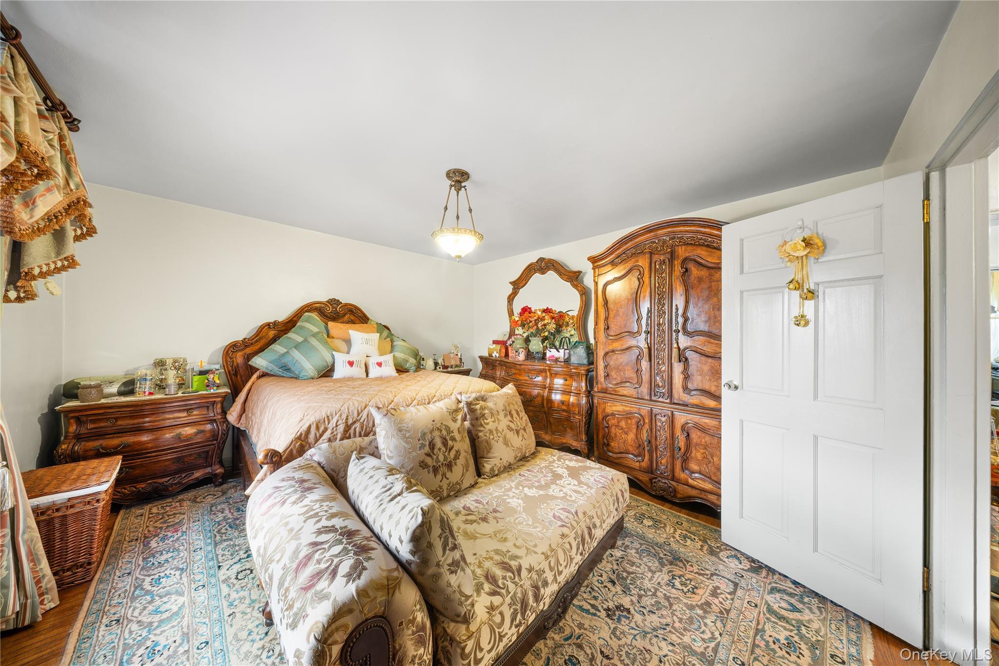 70-79 Park Drive East, Unit B Queens, NY 11367 - Photo 12 of 25 Bedroom with wood finished floors