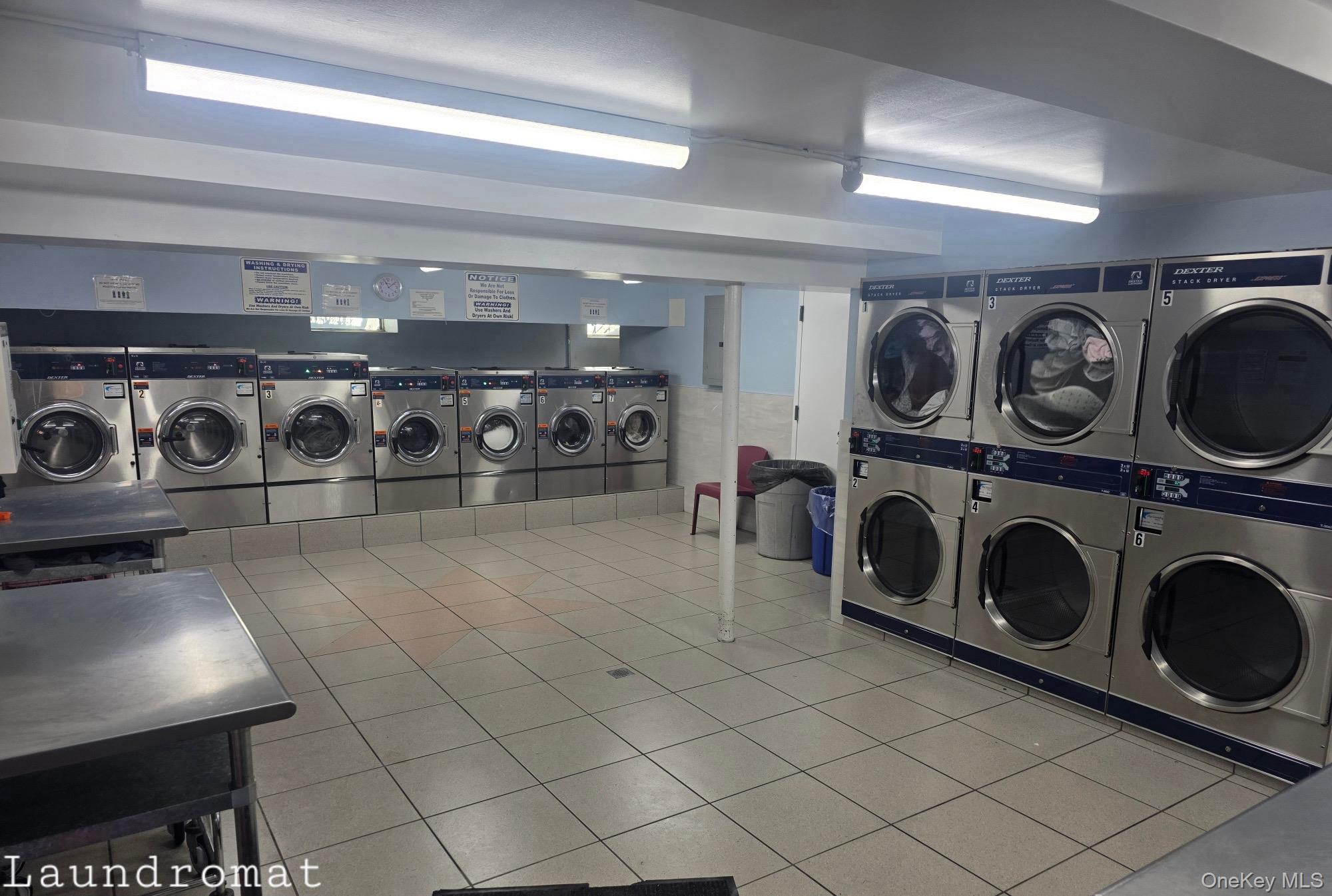 70-79 Park Drive East, Unit B Queens, NY 11367 - Photo 17 of 25 Shared laundry with independent washer and dryer