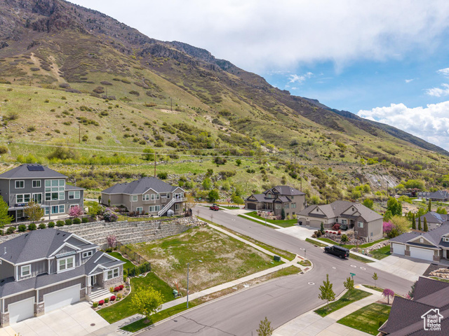 Property view of mountains featuring a residential view