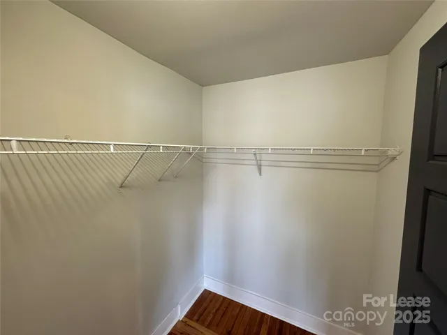 a view of a room with racks on the wall