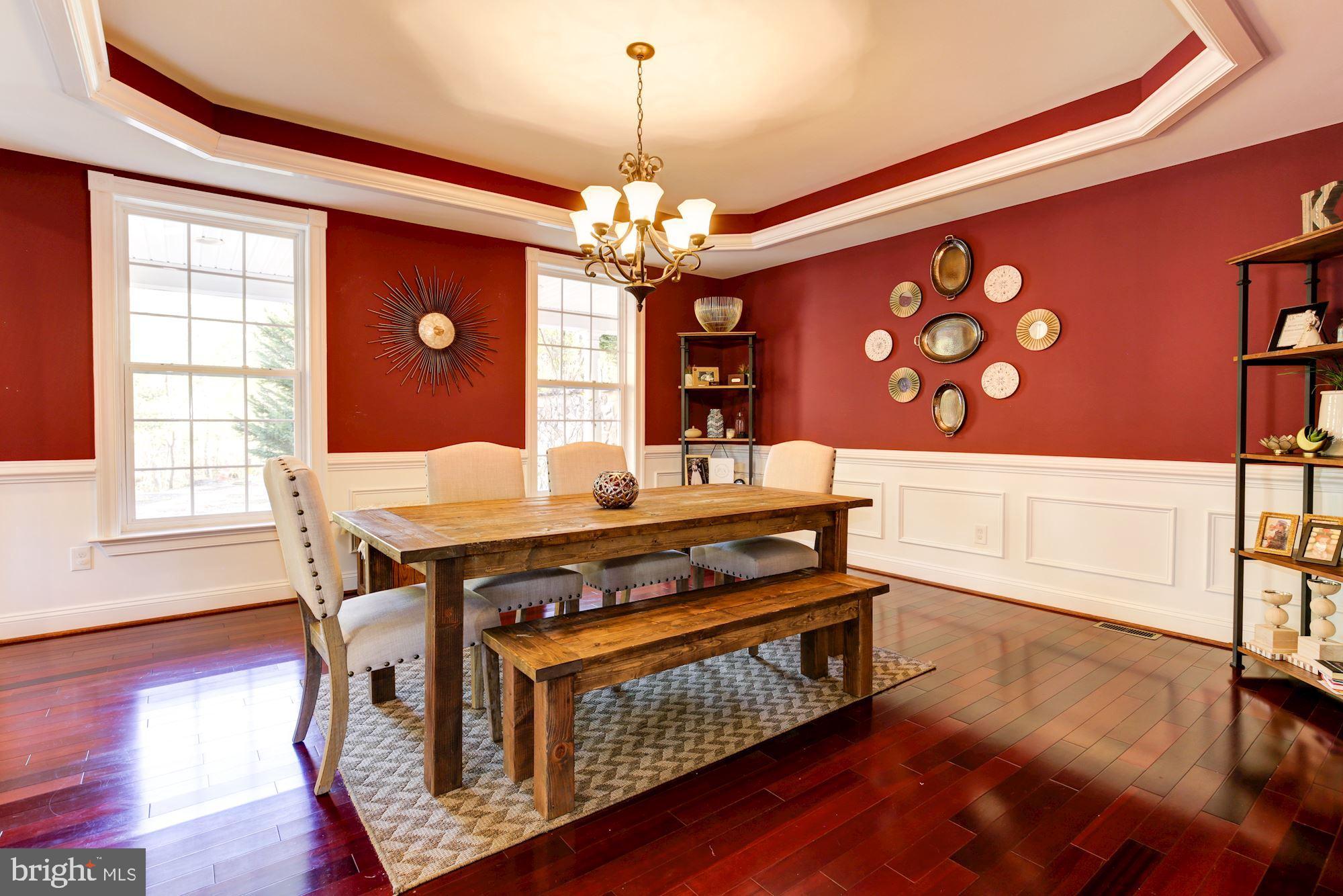 8100 Dogwood Road Baltimore, MD 21244 - Photo 19 of 53 Gleaming hardwood flooring in dining room