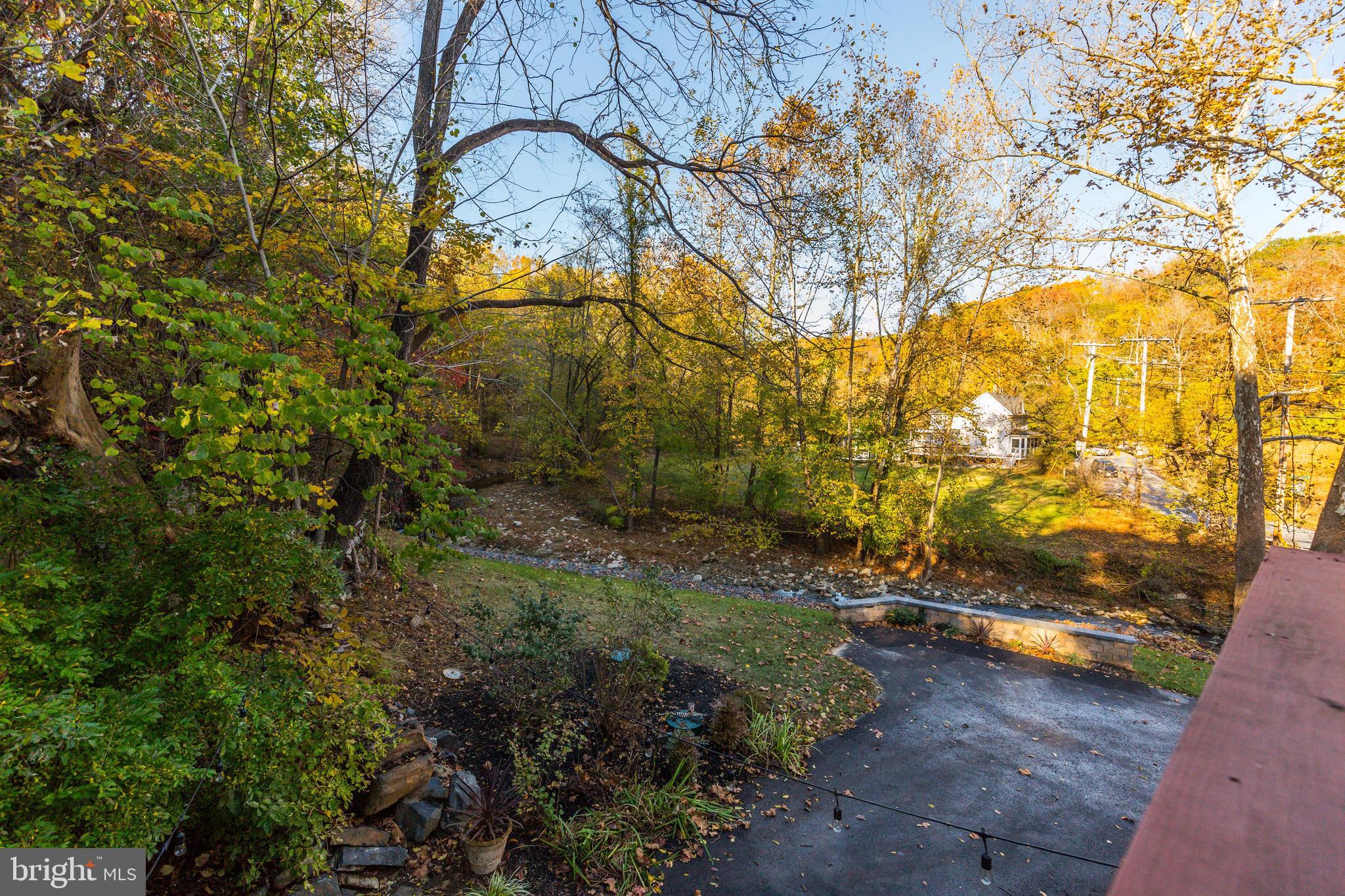 8100 Dogwood Road Baltimore, MD 21244 - Photo 32 of 53 Forest and stream views from balcony