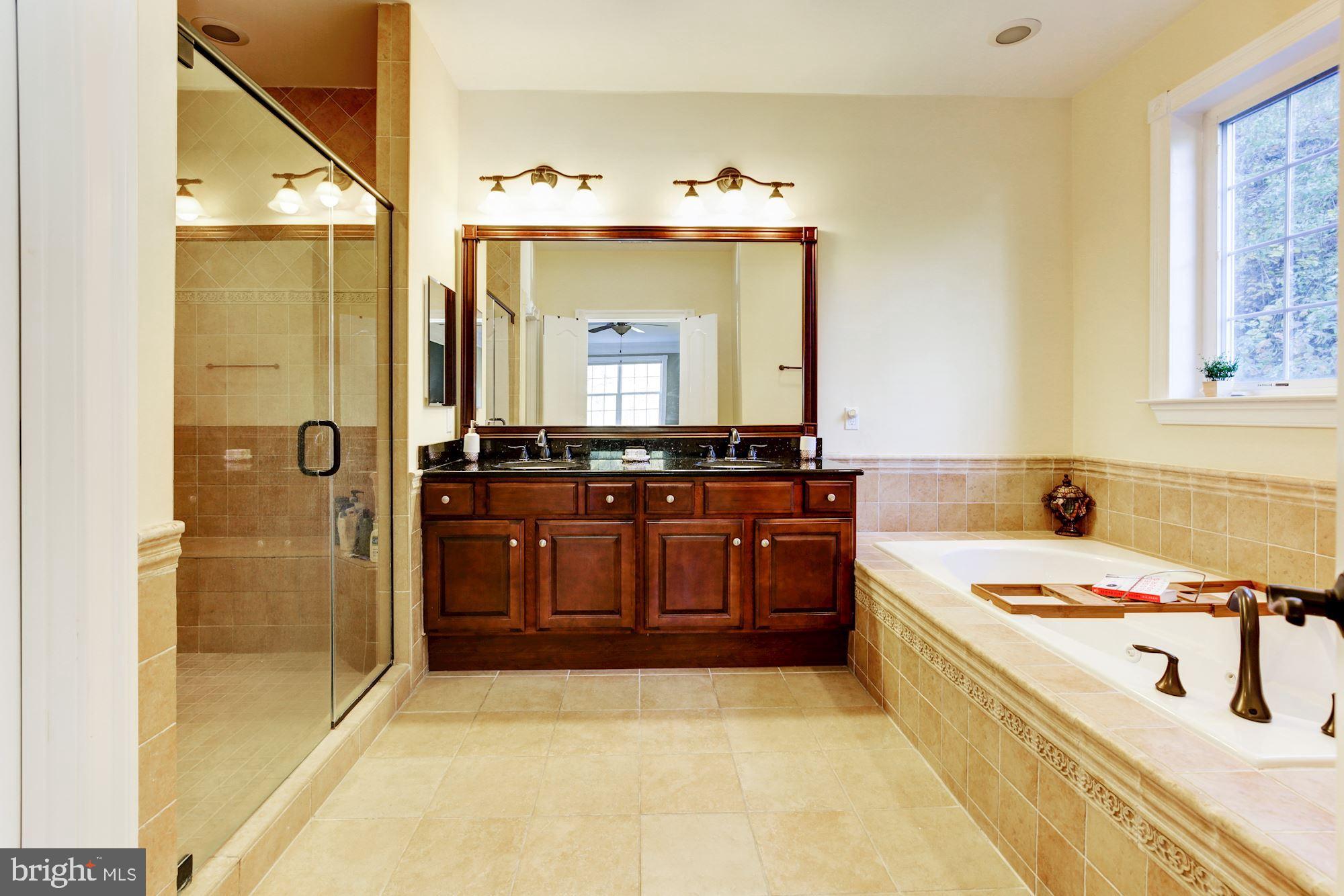 8100 Dogwood Road Baltimore, MD 21244 - Photo 33 of 53 Luxurious master bathroom with dual vanities
