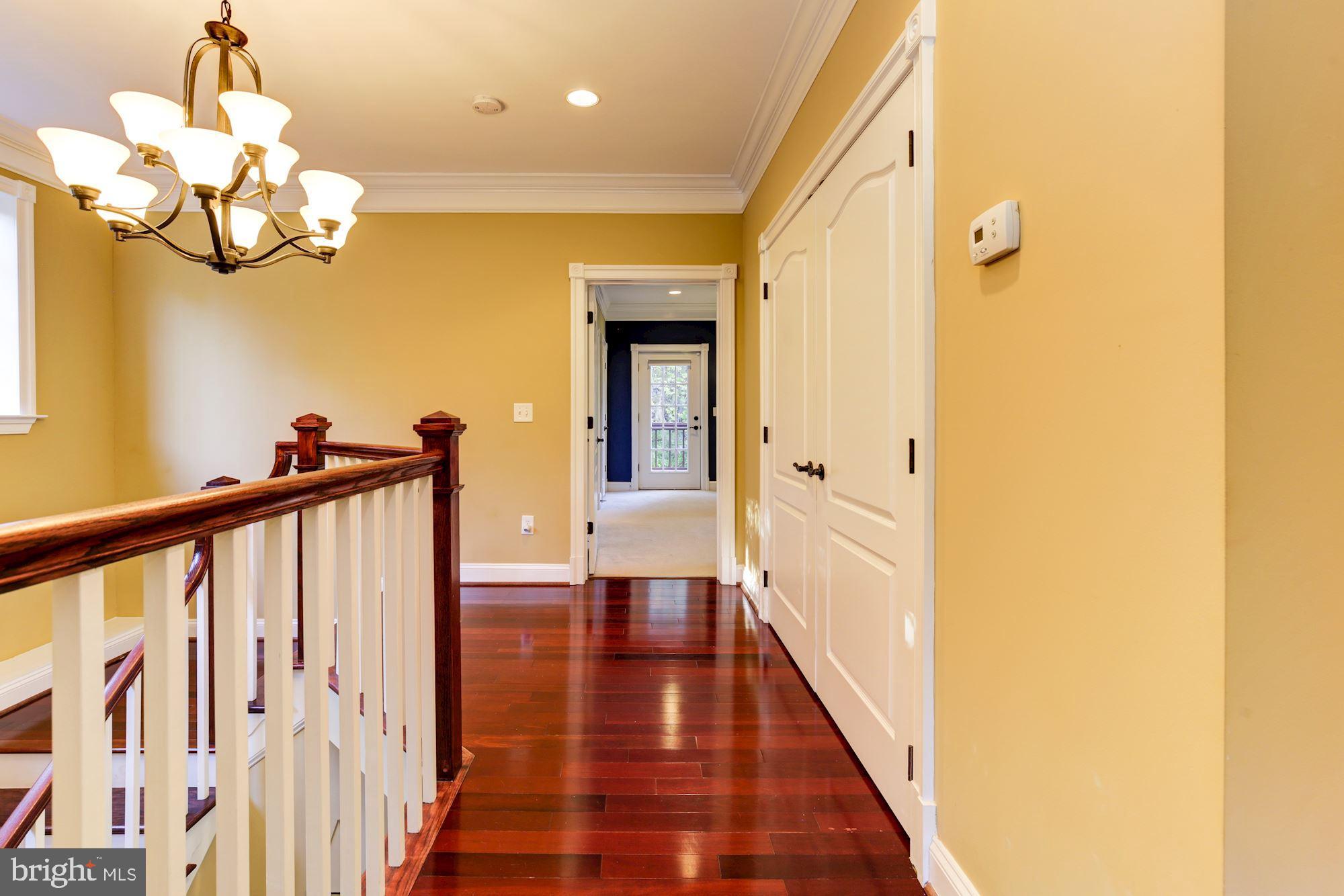 8100 Dogwood Road Baltimore, MD 21244 - Photo 36 of 53 Upper level hallway boasts gleaming hardwood