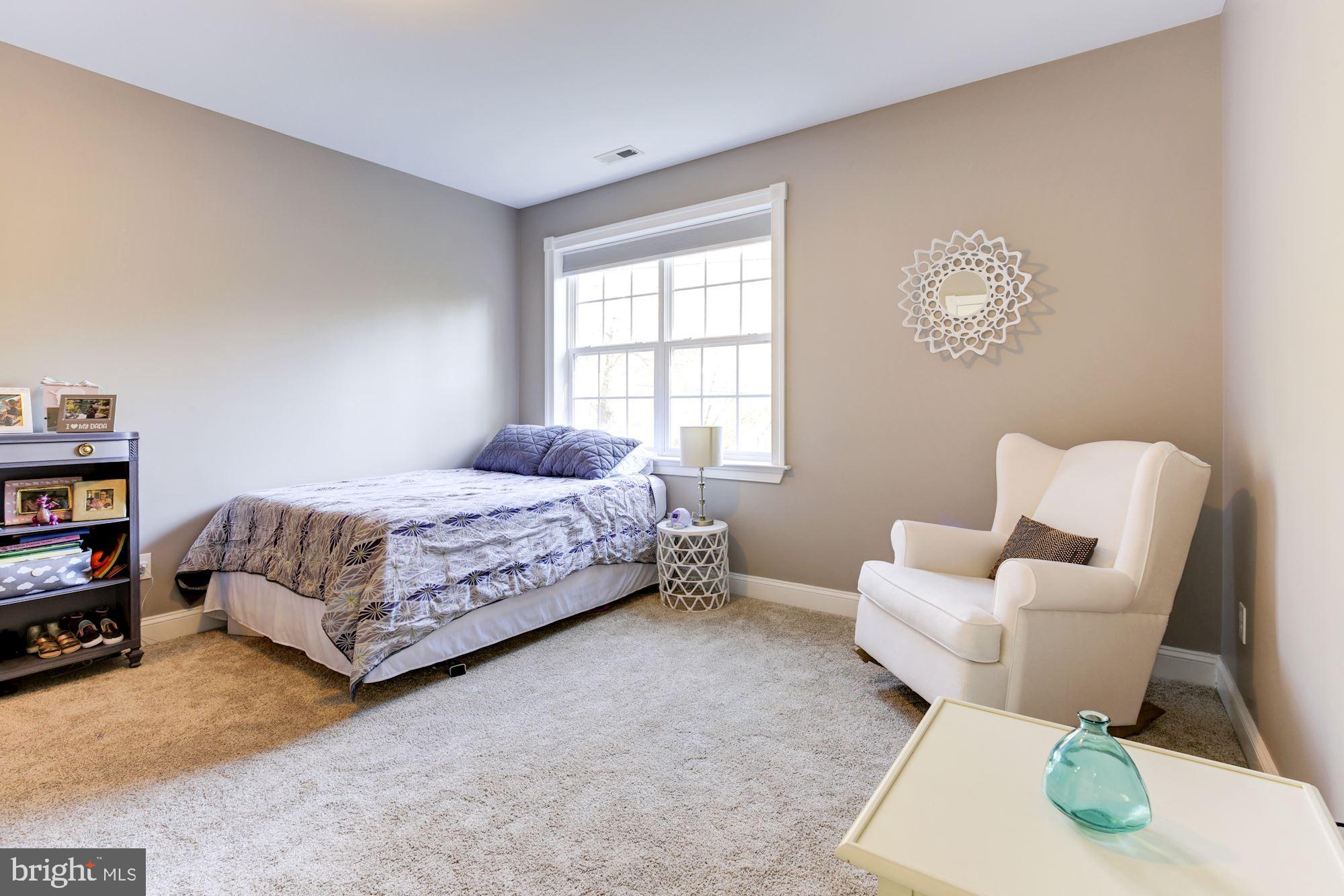 8100 Dogwood Road Baltimore, MD 21244 - Photo 39 of 53 Room features neutral paint and carpeting