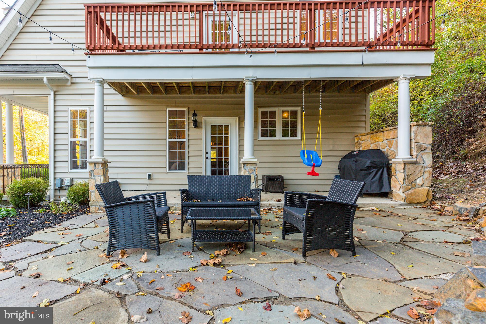 8100 Dogwood Road Baltimore, MD 21244 - Photo 45 of 53 Stone patio on side of home