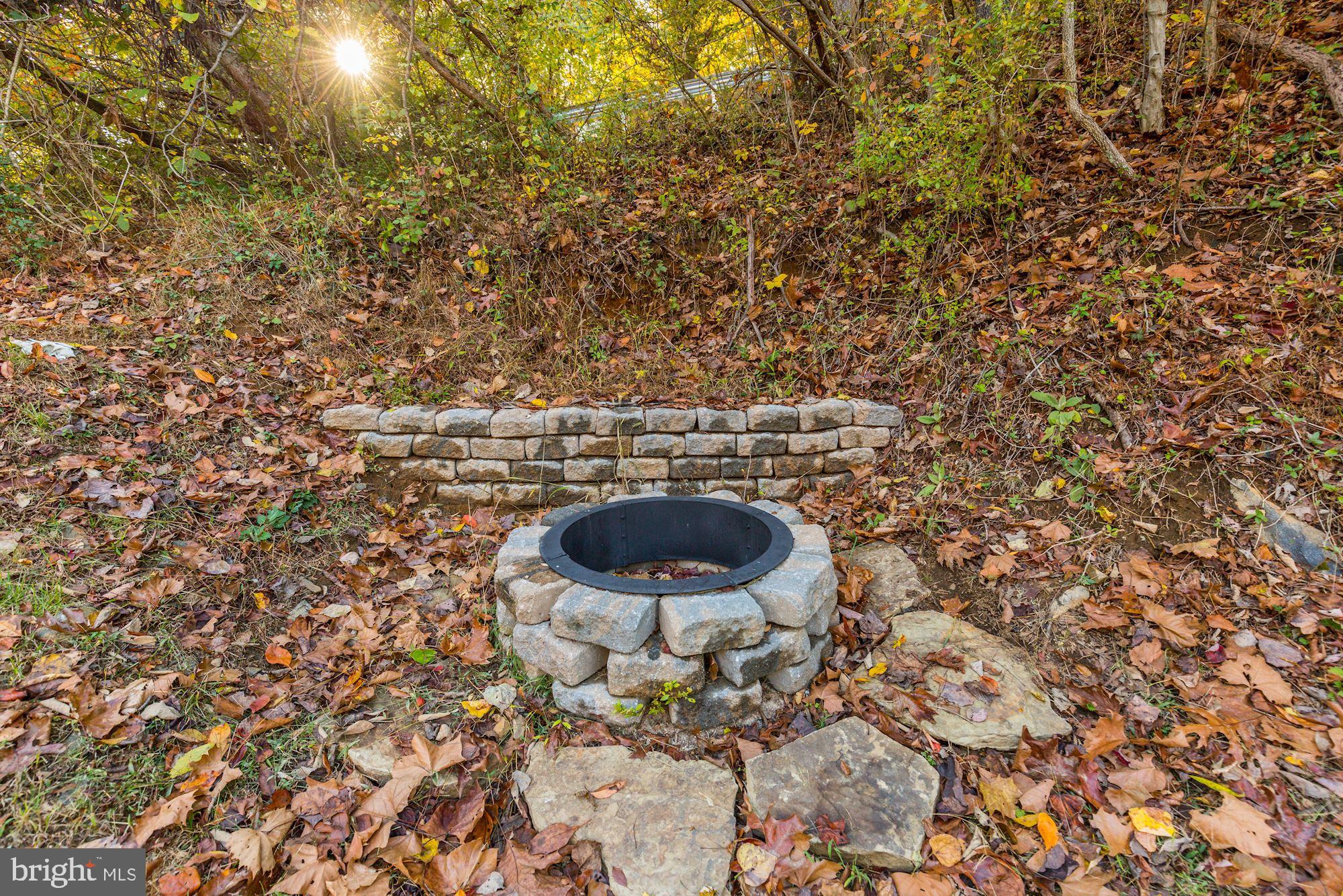 8100 Dogwood Road Baltimore, MD 21244 - Photo 47 of 53 Fire pit behind the home for family fun