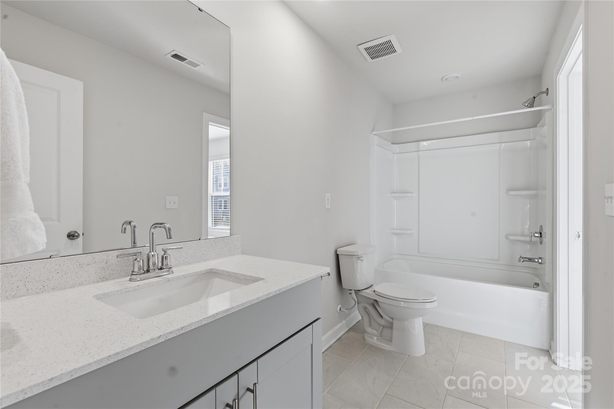 3528 Auburn Curb Road Charlotte, NC 28217 - Photo 26 of 35 a bathroom with a sink toilet and shower